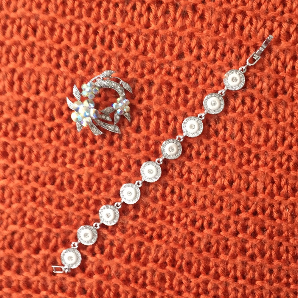 Brooch and bracelet.